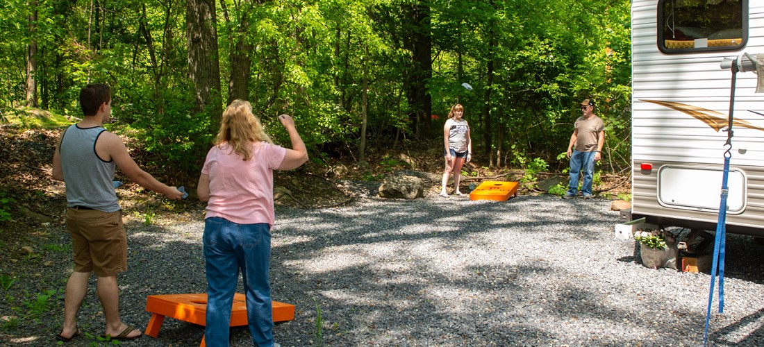 Playing corn hole at the site