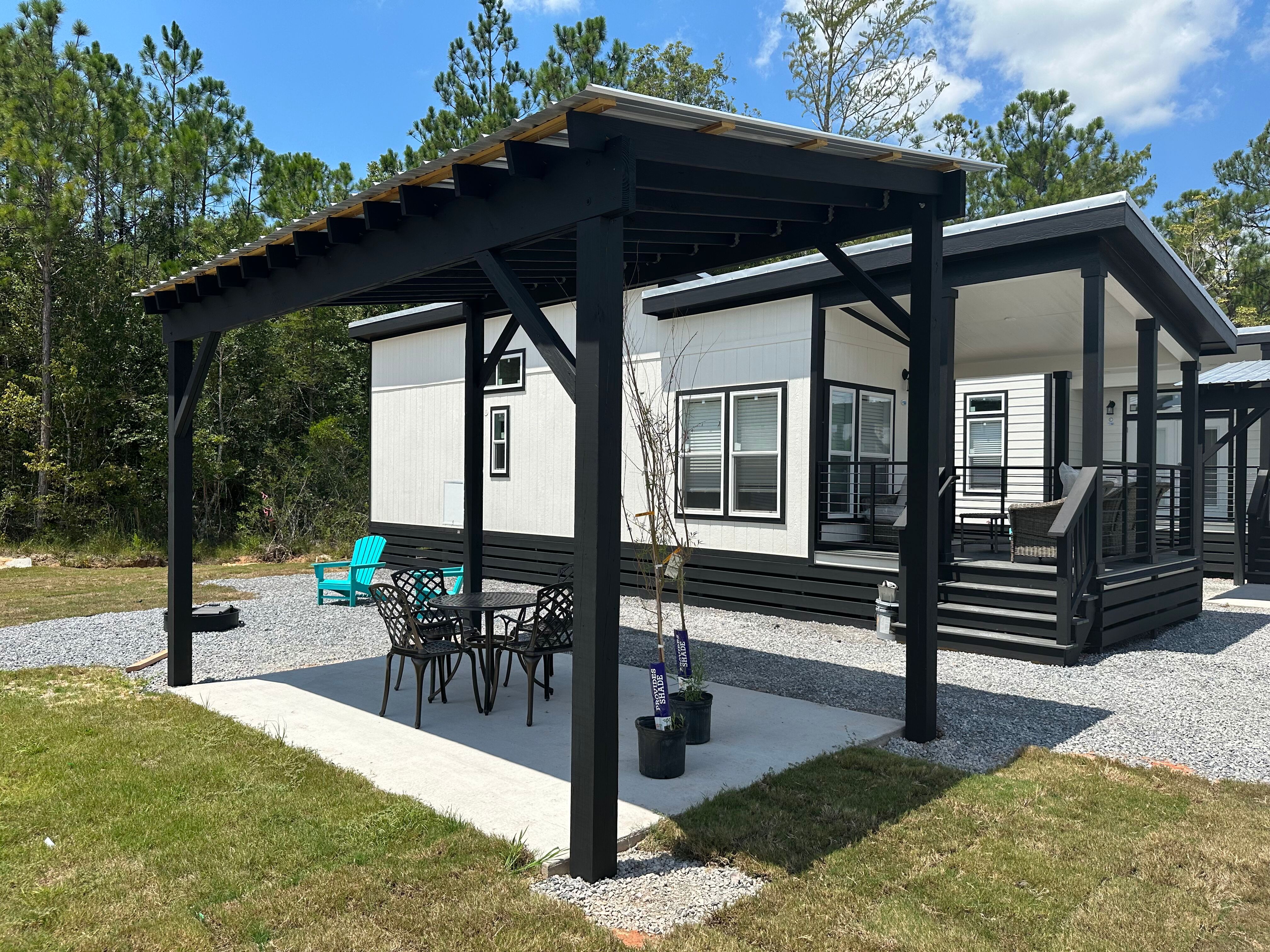 Deluxe Cabin (Full Bath with Shower), KOA Patio ® Pictures Gulfport