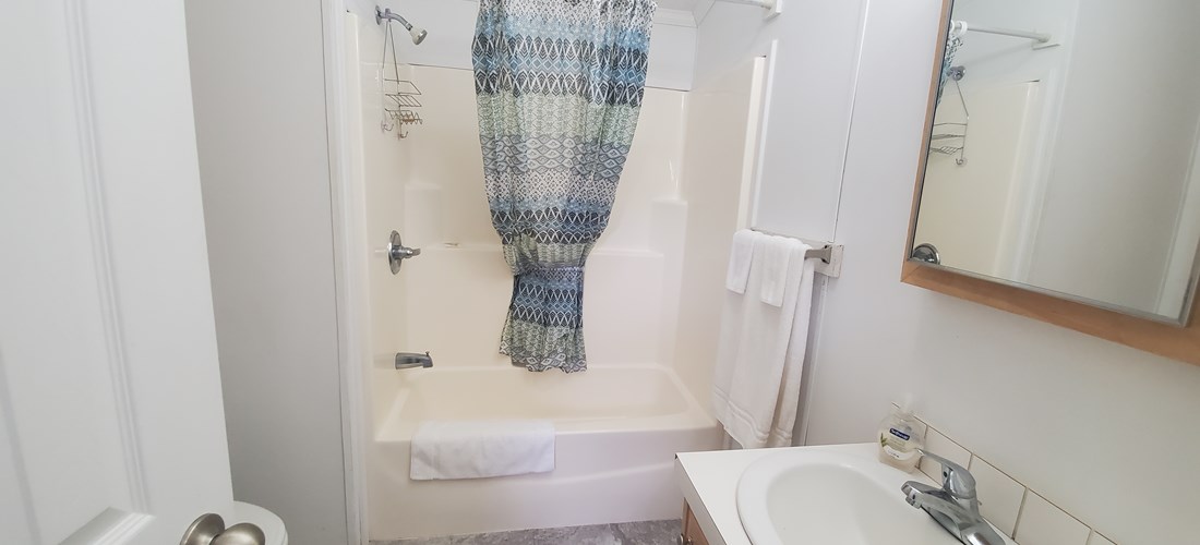 Our Cabin King's have a full size bathroom with a tub/shower, sink and toilet. Linens are not provided unless requested.