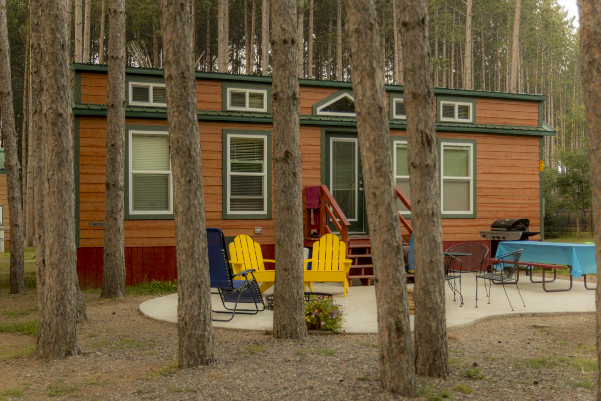 Come enjoy luxury in the north-woods.  These spacious deluxe cabins come in a variety of floor-plans and kitchen set ups.  They all have sleeping lofts, satellite TV, sleep 8 people and have a patio with fire rings, tables and seating.  Family fun ready!