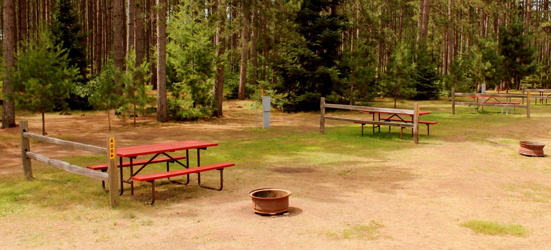 Our beautiful, clean RV sites accommodate every type of camper.  Back-ins, pull-throughs, full hookups or water/electric.  All are family ready with picnic tables, fire rings and the north-woods setting.  Choose your site today!
