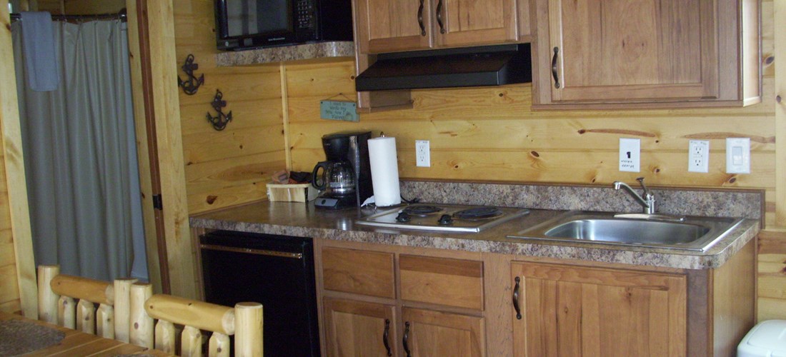Deluxe Cabin creek-side kitchen.