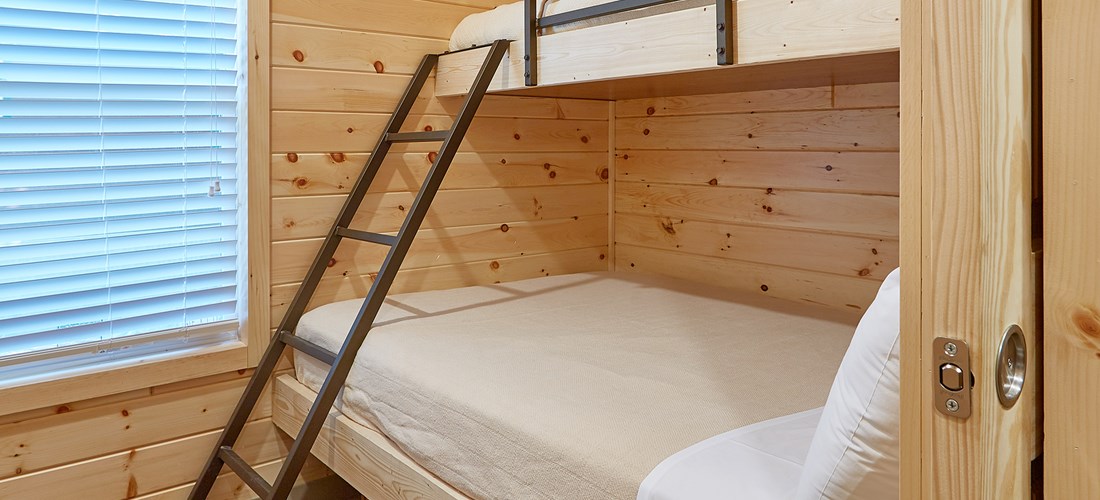 Premium Cottage bedroom with twin over full bunk.