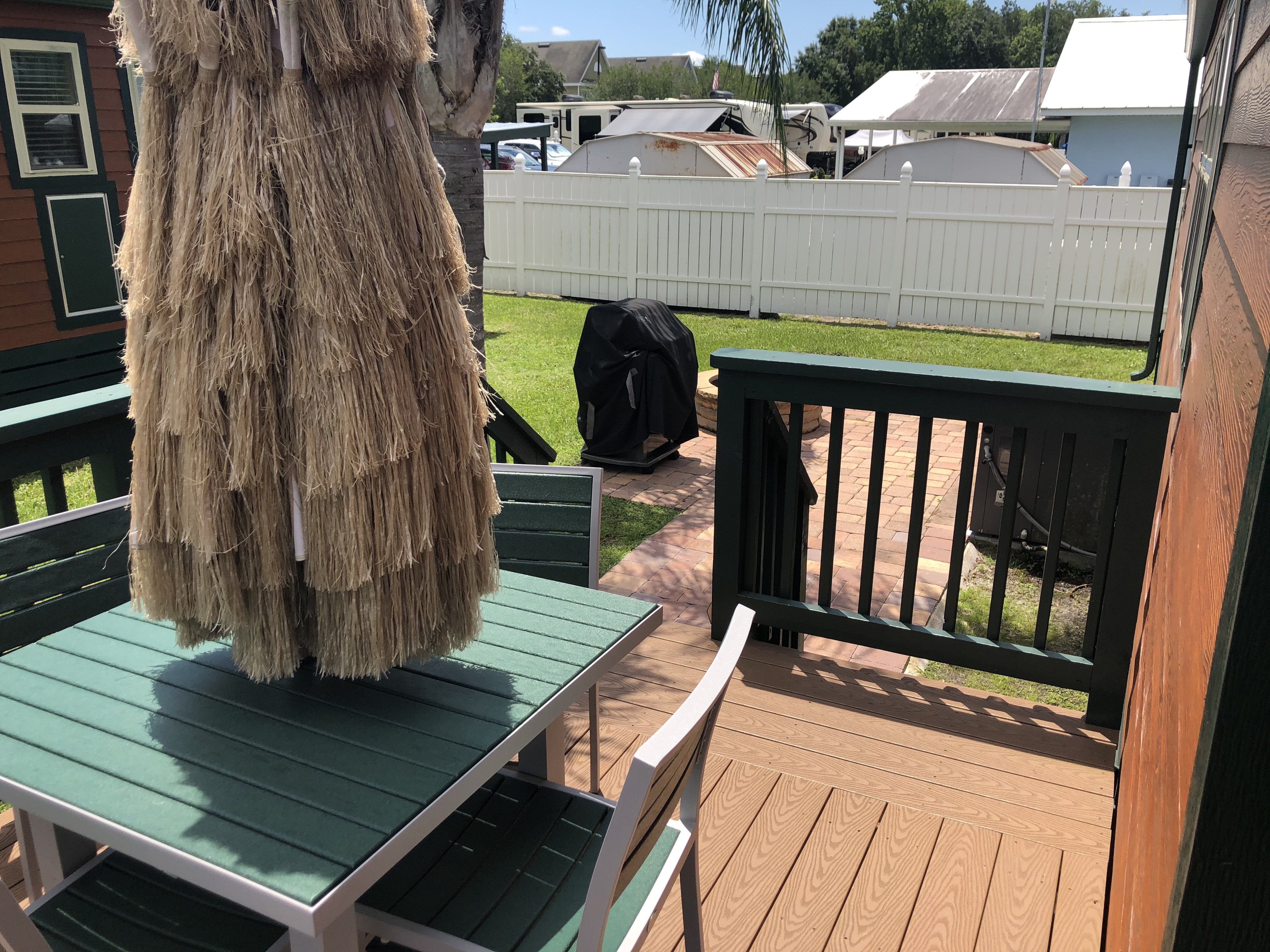 Porch patio that leads to Fire pit and gas grill