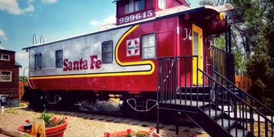 Stay in Style Inside a 1928 Railroad Caboose!