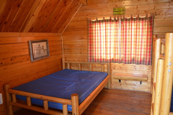Double Bed in One Room Cabin