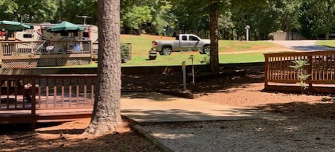 Lake view 30amp back in; full hook up. Enjoy your camping trip with one of our scenic campsites next to Lake Oconee. Each campsite is different, This is one picture of one campsite.