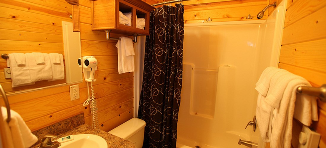 You won't have to "rough it" when you stay in one of our cabins with a full bathroom.