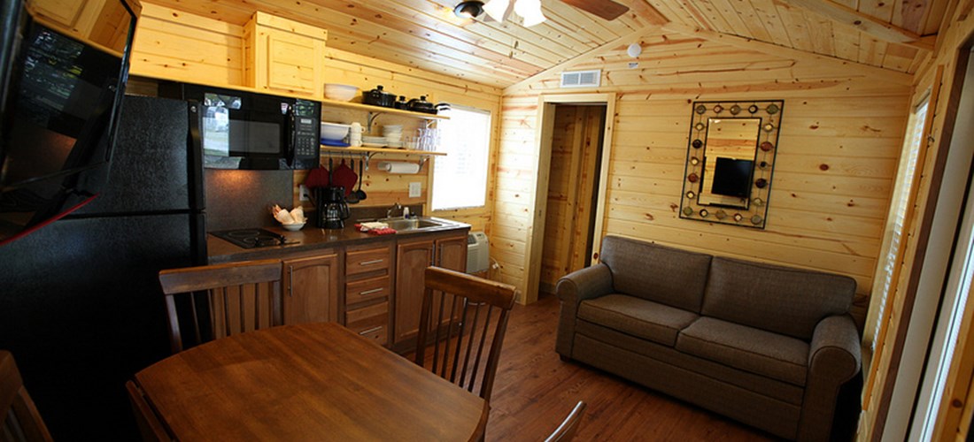Our cabins even have televisions and the living and kitchen are are well appointed.