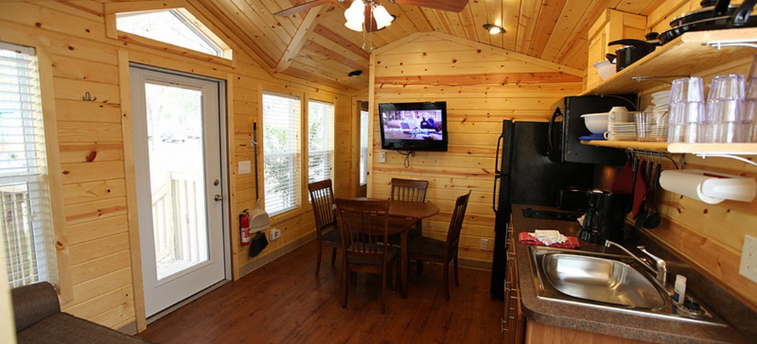 The kitchen and living room have many amenities to make your stay comfortable.