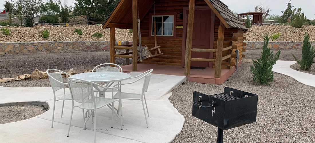 Each Cabin Has It's Own Patio with Furniture, Fire Pit and Charcoal BBQ Grill