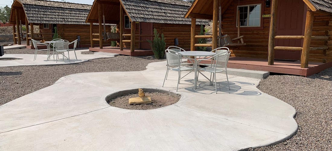 Private Patio with Fire Pit and Table and Chairs Available at Each Cabin
