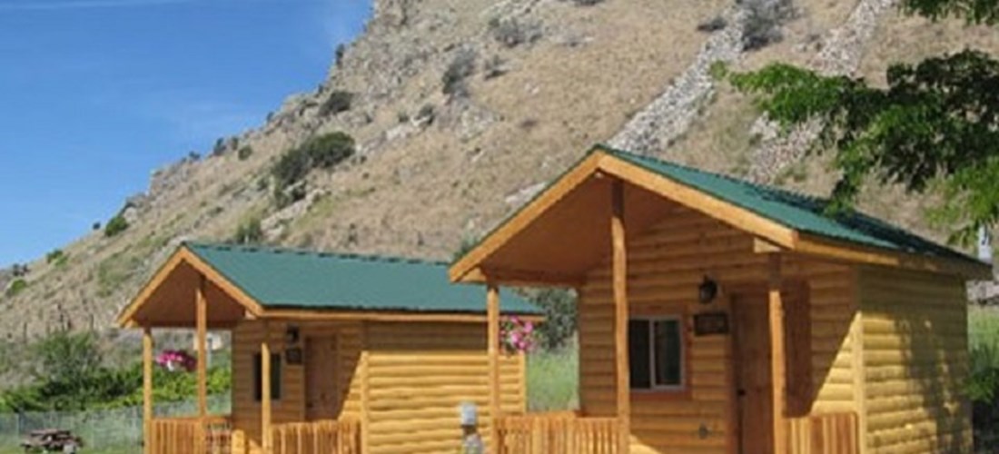 Camping Cabins #C60, C61, C62 and C66. 1 double bed, 1 set of bunks. No bathroom, close to bath house.
