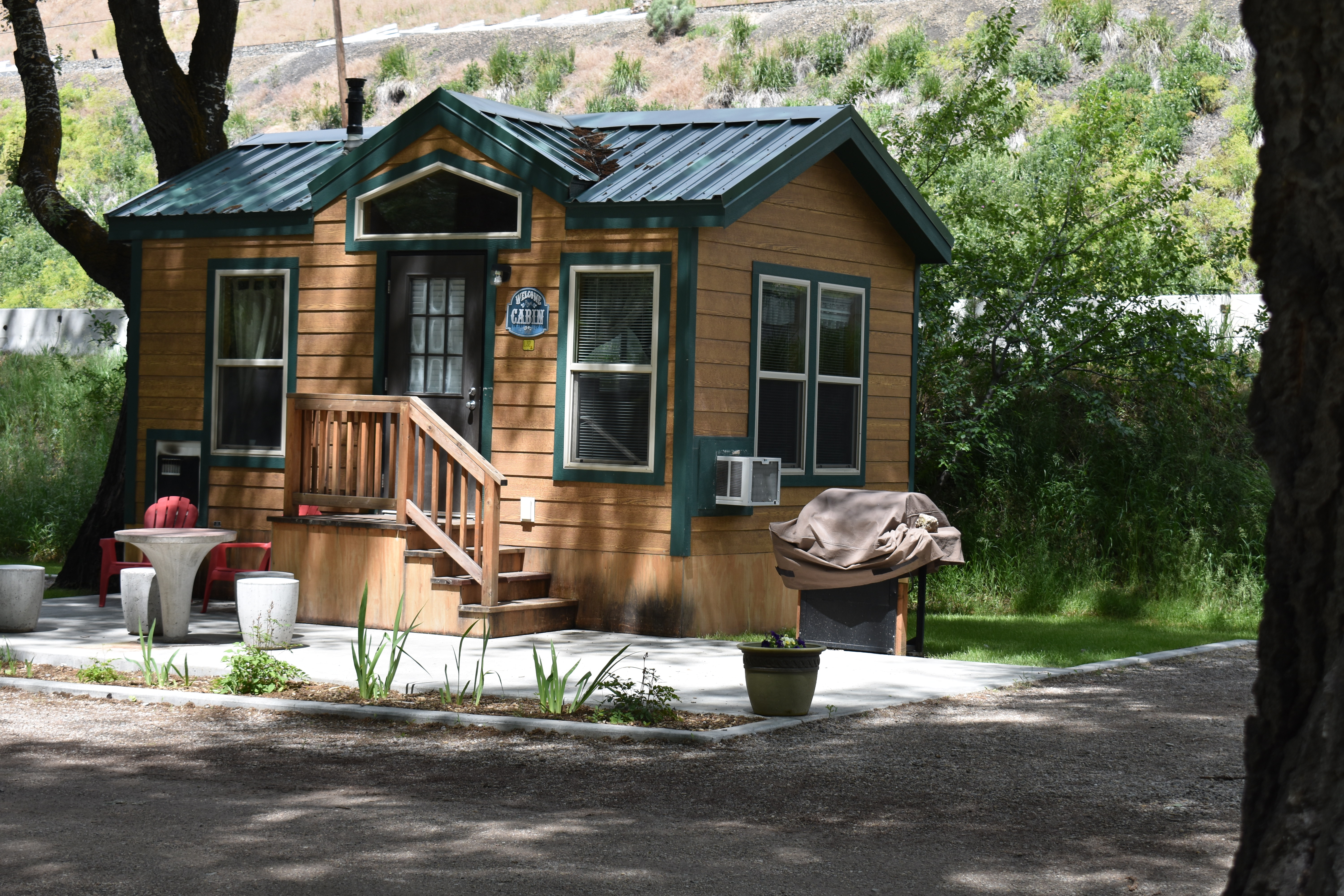 Cabins #L30, L31, L32. Bathroom, 1 double bed, 1 set of bunks. Bring own sleeping bags, pillows, and towels.
