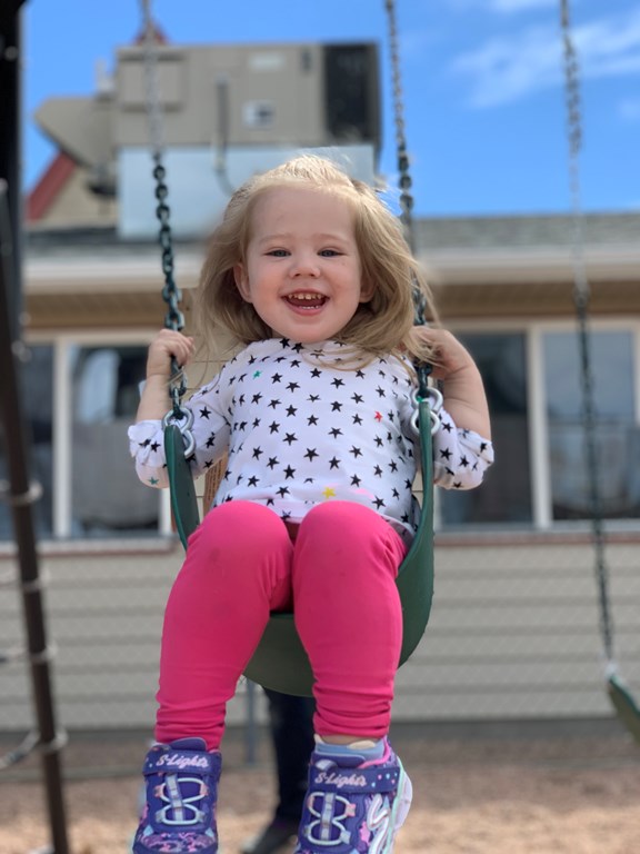 Girl on Swing