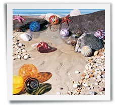 FINDERS KEEPERS. GLASS FLOATS ON THE BEACH