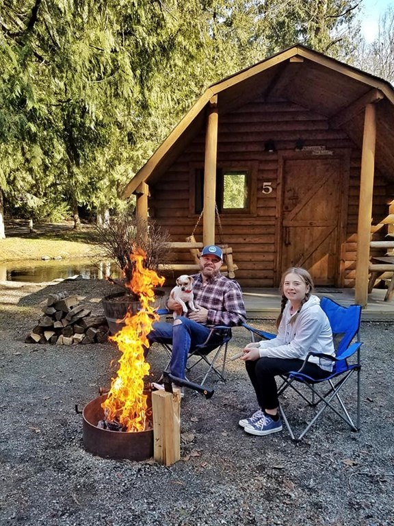 Enjoying the campfire outside Cabin 5
