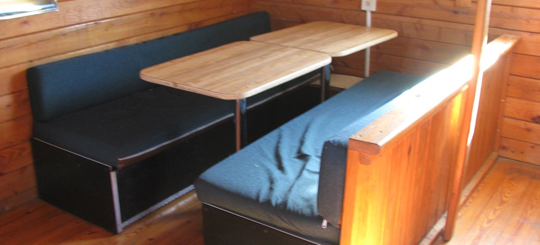 Cabin 3 Inside Kitchen Table/ Bed