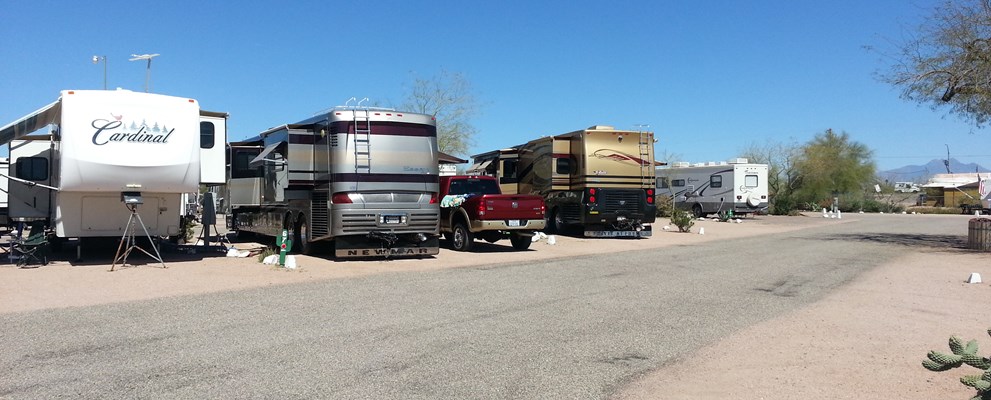 Pull Thru, 50/30 Amps, Full Hookups Enjoy the beauty of the Superstition Mountains from your own campsite. These large pull-thru sites are perfect for the overnight big rig traveler. Golf, shopping and sightseeing are nearby.