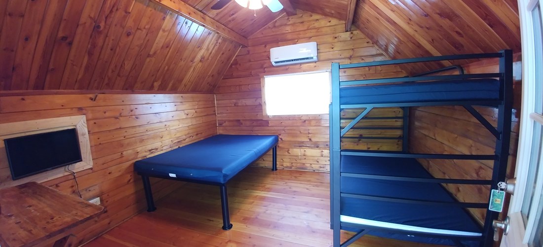 All rustic cabins have been upgraded for your comfort!  New roof, windows door, a/c, beds and 23" flat screen tv.