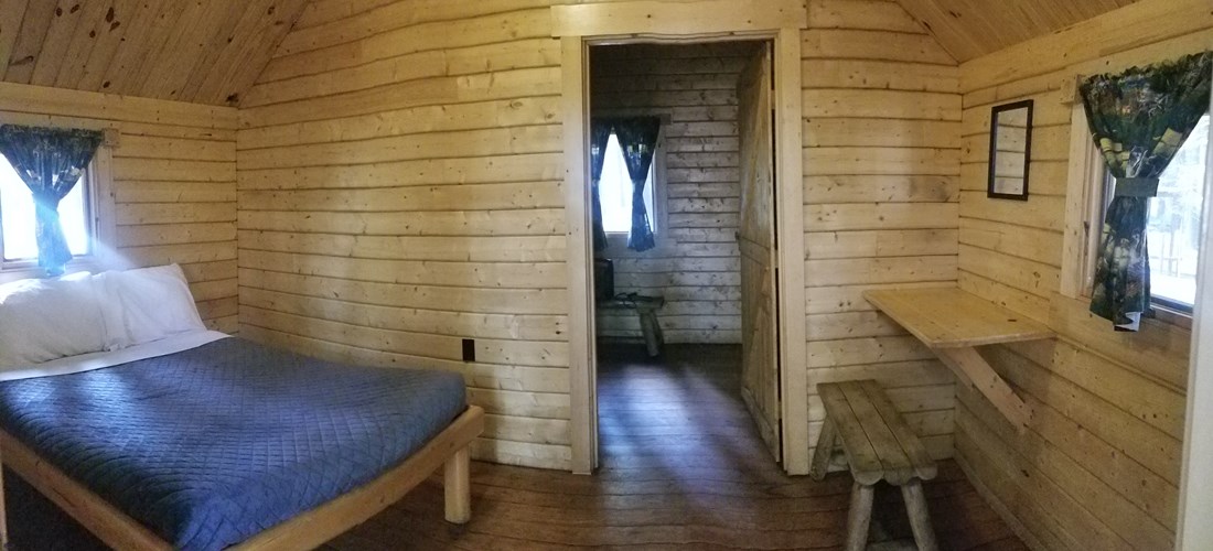 2-Bedroom Camping Cabin Interior, sleeps up to 6 people. Linens provided during the winter.