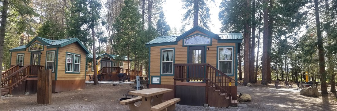 K5 & K6 Deluxe Cottages Sleeps up to 4 people. All linens, towels, and coffee provided. Includes a concrete picnic table and a fire ring with a flip top grill on the fire ring to cook on.