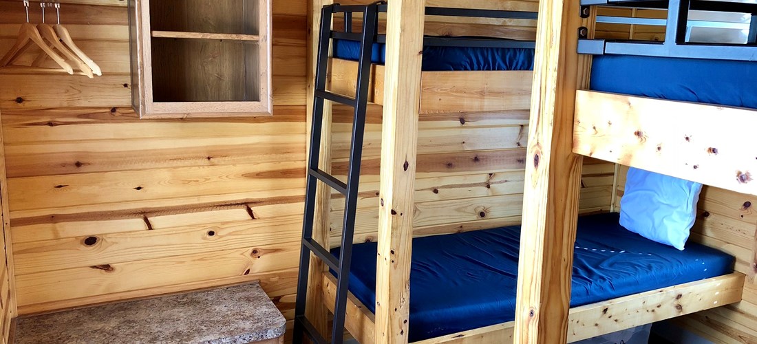 2 sets of bunks means everyone has their own bed and space.