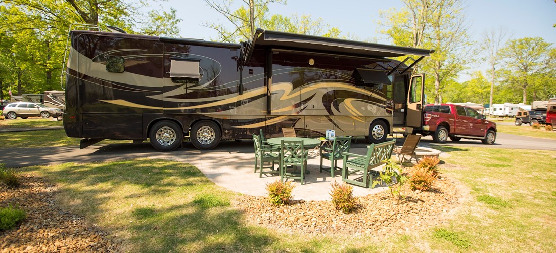 Our deluxe pull-through sites are our most popular and requested sites. They are long paved sites with beautiful landscaping.