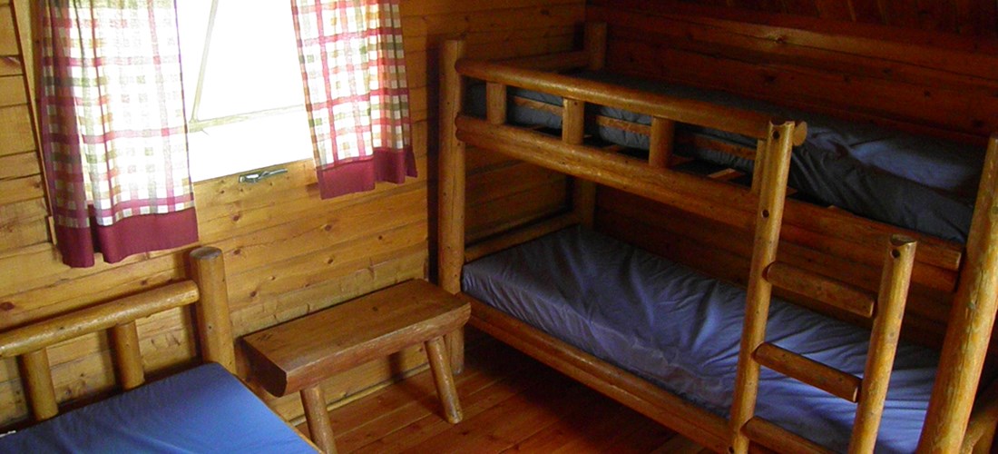 Double bed and a set of bunks, sleeps four.