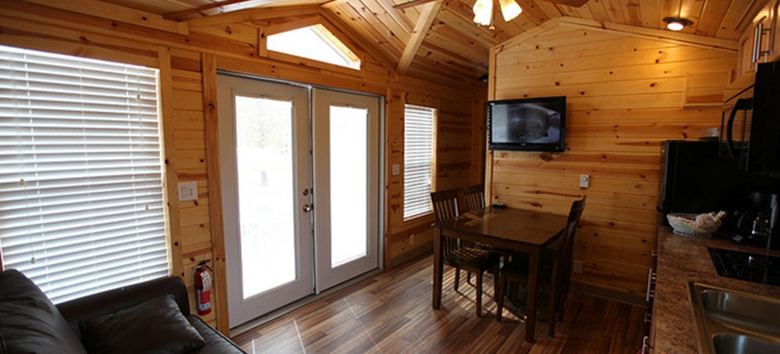 Our Deluxe Cabins even have televisions and the kitchens have all the amenities you'll need for your stay.