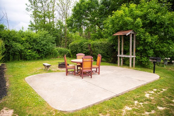 Tent Site, Water + Electric with KOA Patio®