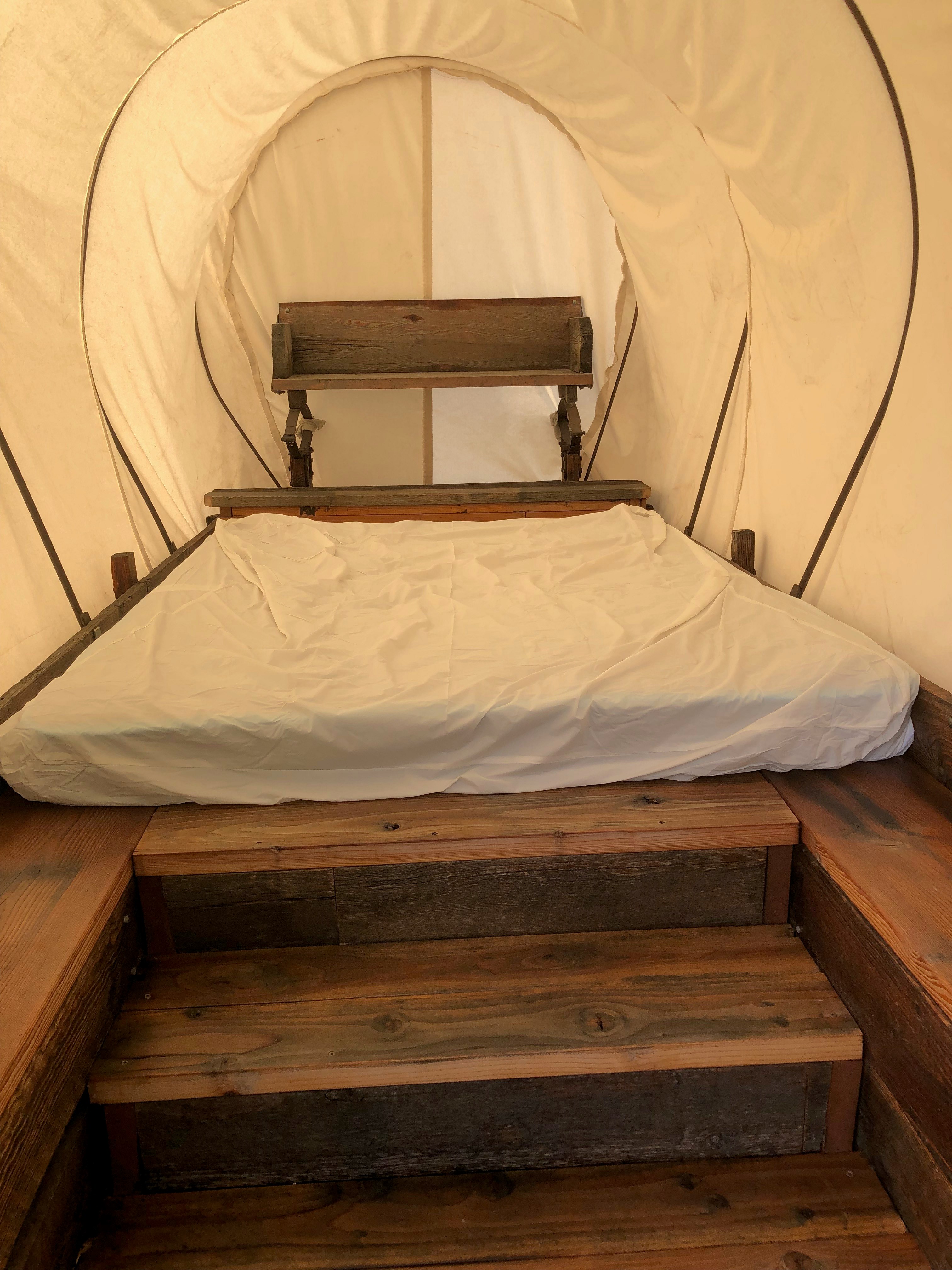 Queen-sized mattress in the covered wagon