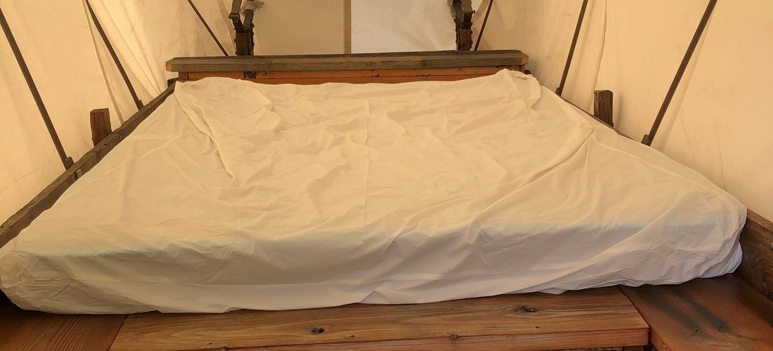 Queen-sized mattress in the covered wagon