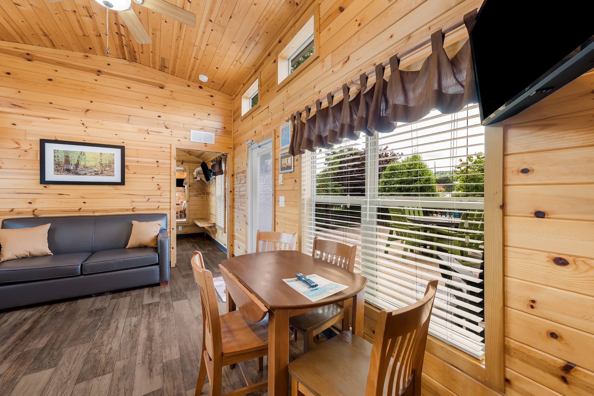 DC301_Deluxe Cabin, 1RM with KOA Patio®, Accessible (Full Bath with Shower) – Sleeps 4