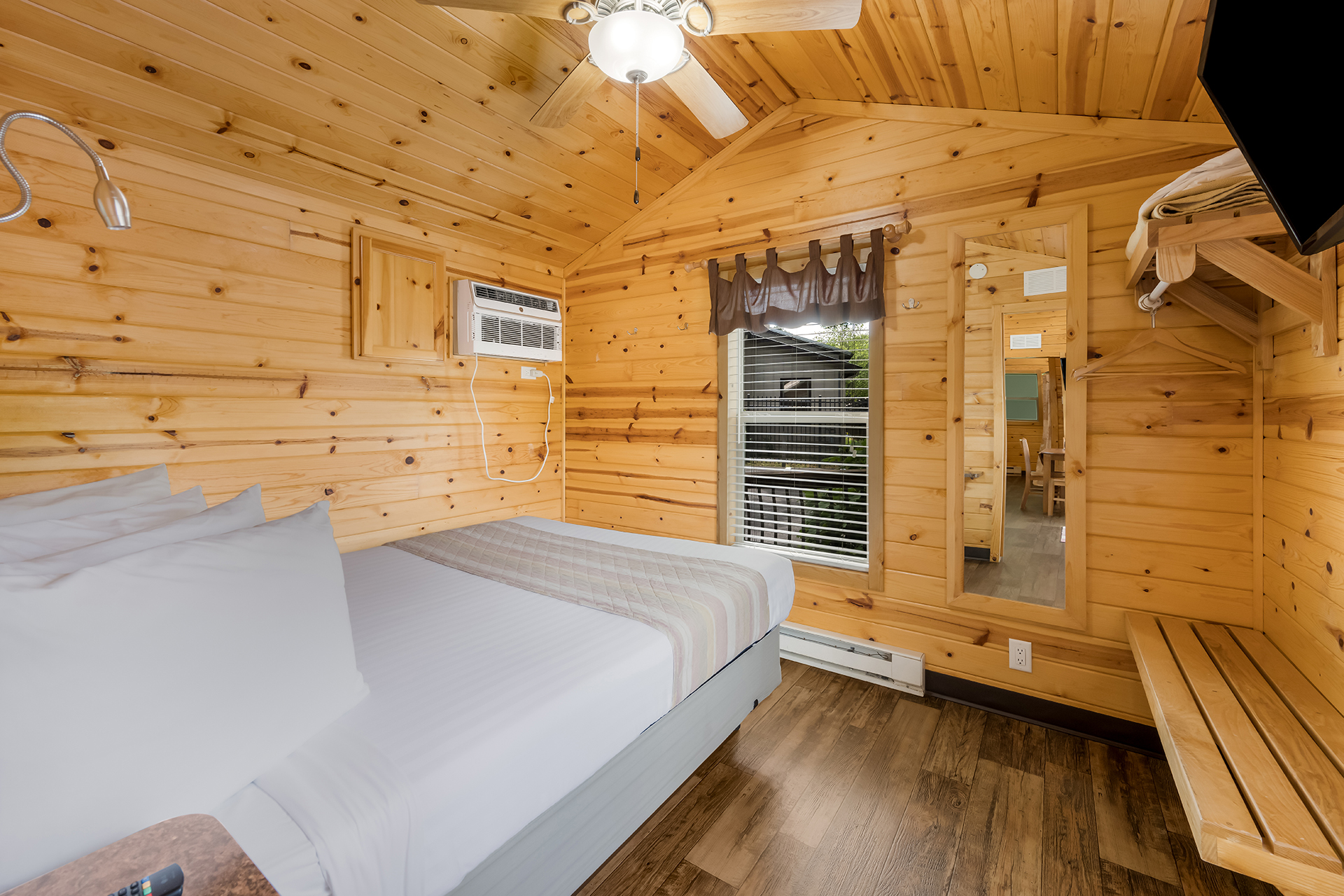 DC301_Deluxe Cabin, 1RM with KOA Patio®, Accessible (Full Bath with Shower) – Sleeps 4