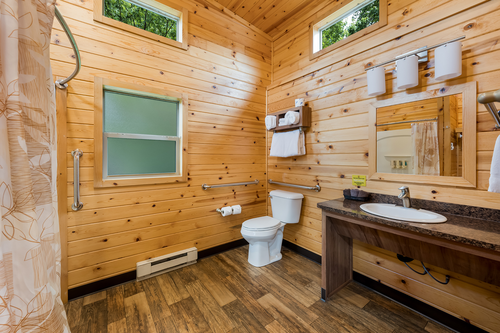 DC301_Deluxe Cabin, 1RM with KOA Patio®, Accessible (Full Bath with Shower) – Sleeps 4