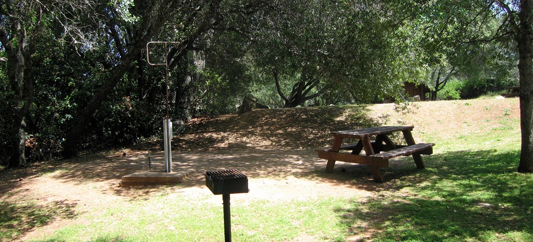 Water and electric tent sites. All have wifi access along with a picnic table and bbq grill. Pictured is tent site 101 which is one of the closest to the playground, kitchen pavilion, bathrooms, and main building.