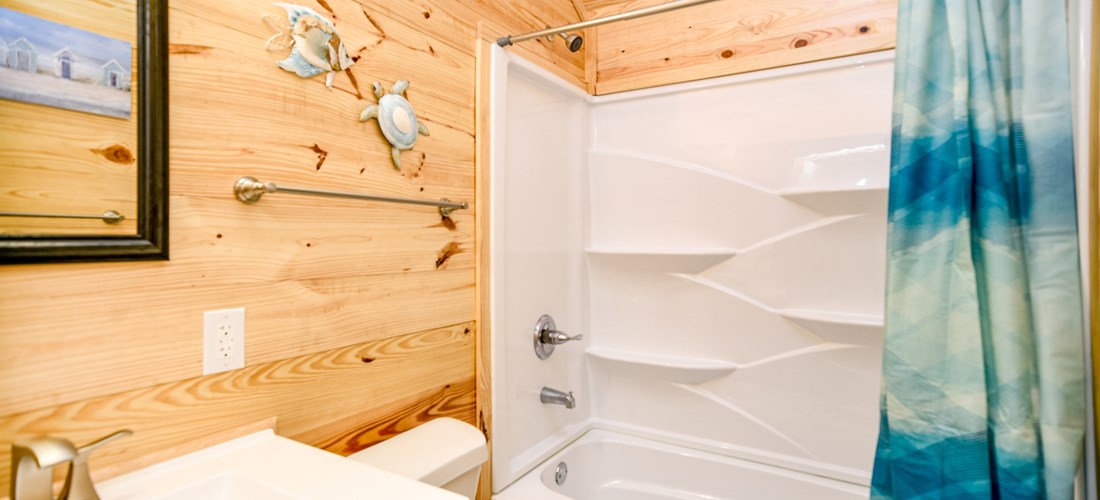 Our one bedroom cabin offers a full restroom.