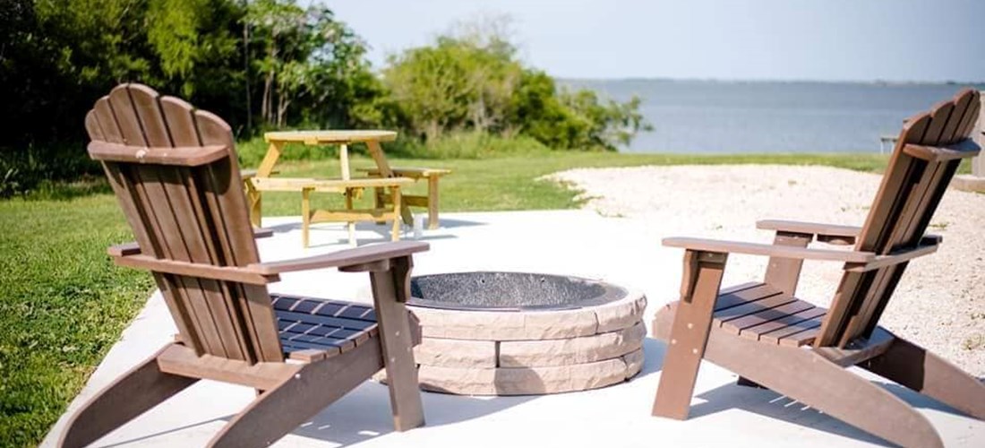 Waterfront Patio Site, with nice seating and a fire pit!
