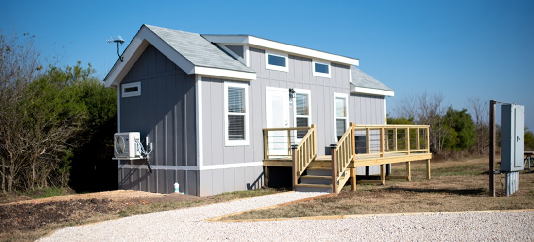 Our Deluxe Cabin has a bunk room as well as a bedroom with a queen bed and sleeps 7 comfortably