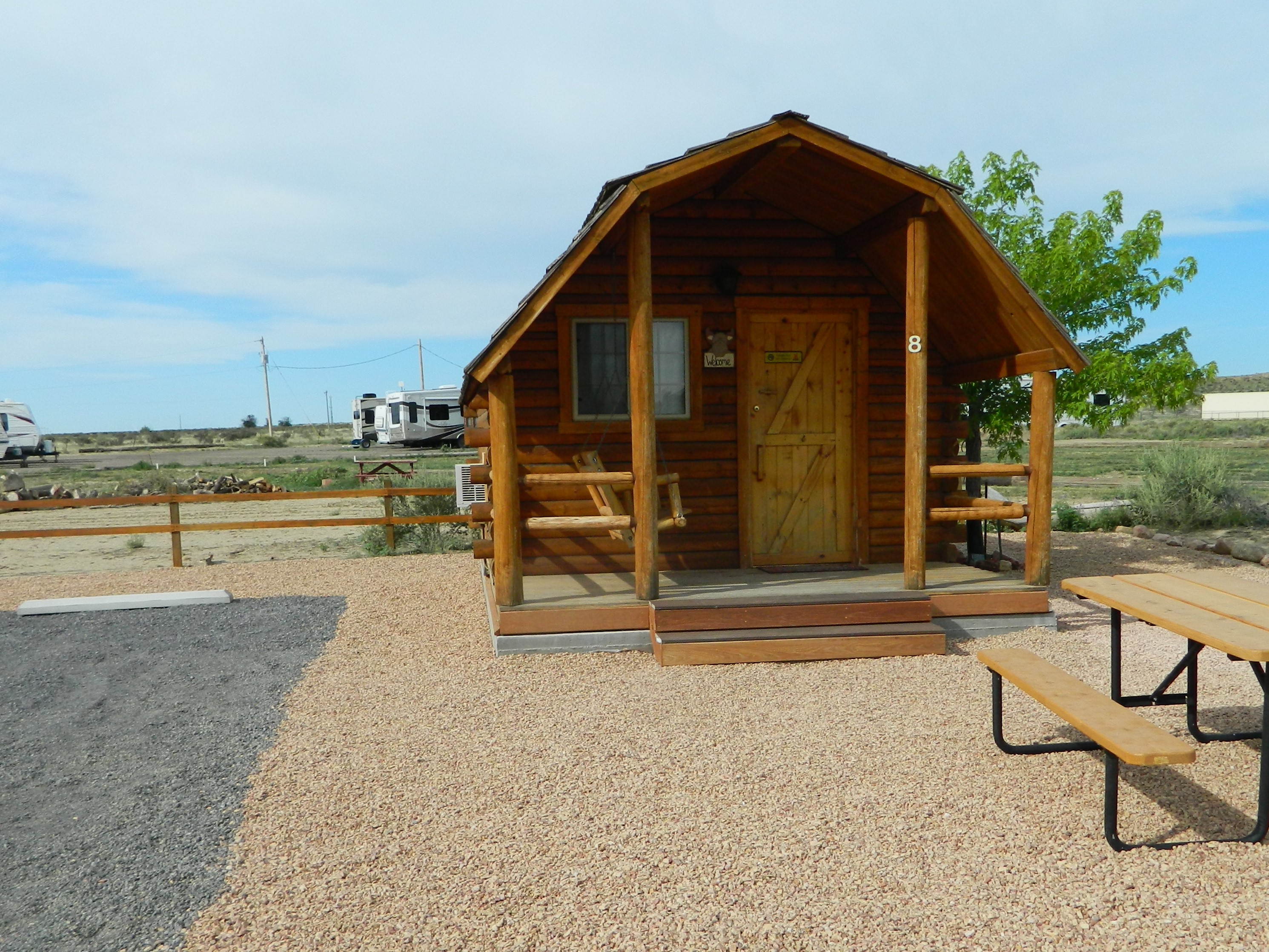 Our basic cabin is your upgrade from a tent.  It has electricity and an air conditioner.  Get out of the wind, rain and off the ground.