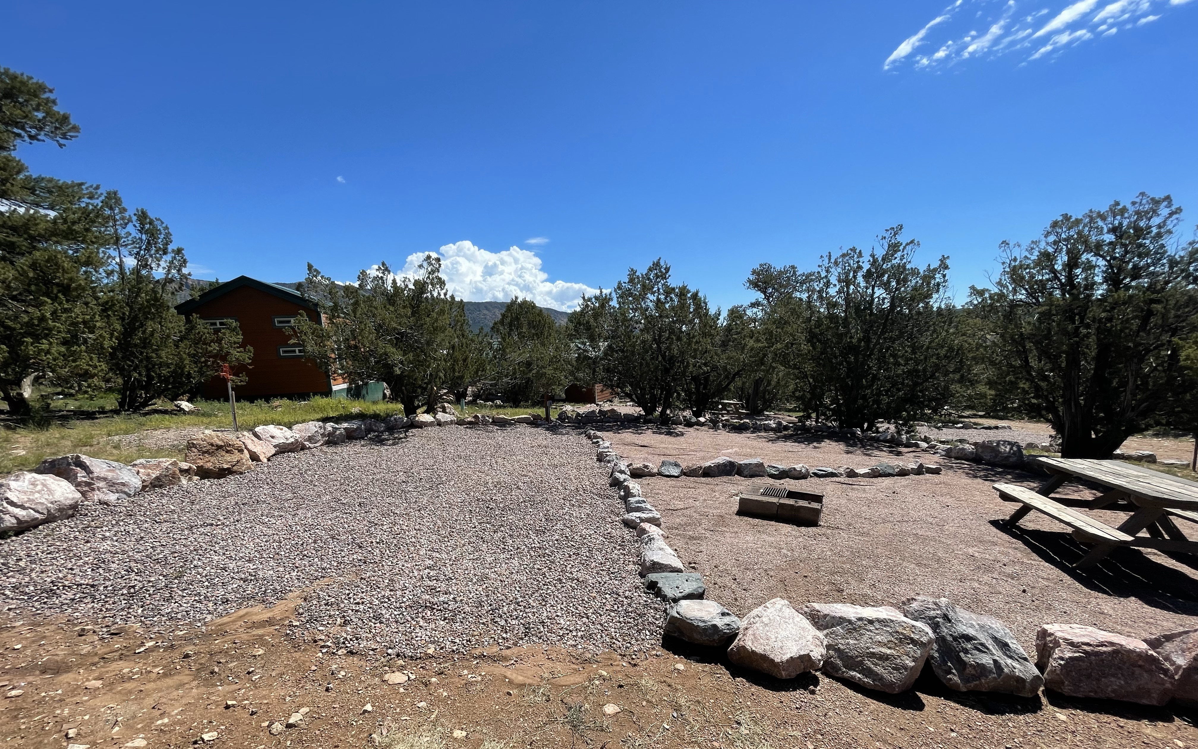 Individual Tent Site, Electric Only, Gravel Tent Pad Deluxe Tent w