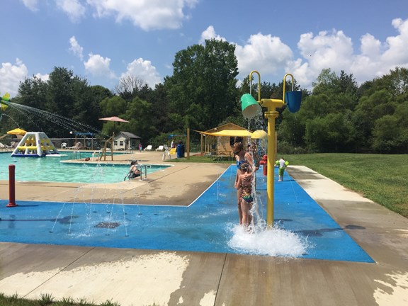Heated Olympic Size Swimming Pool and Splash Pad