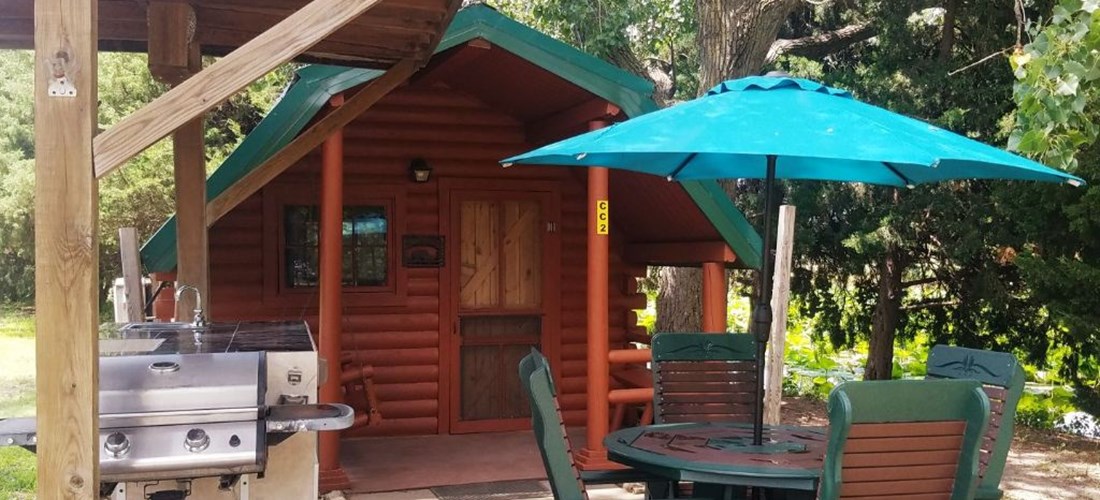 Camping Cabin 2
Next to Fishing Pond and close to pool, and short walking distance to bathrooms, A/C/Heat, picnic table outdoor kitchen with mini fridge and TV/Cable. Sleeps 4