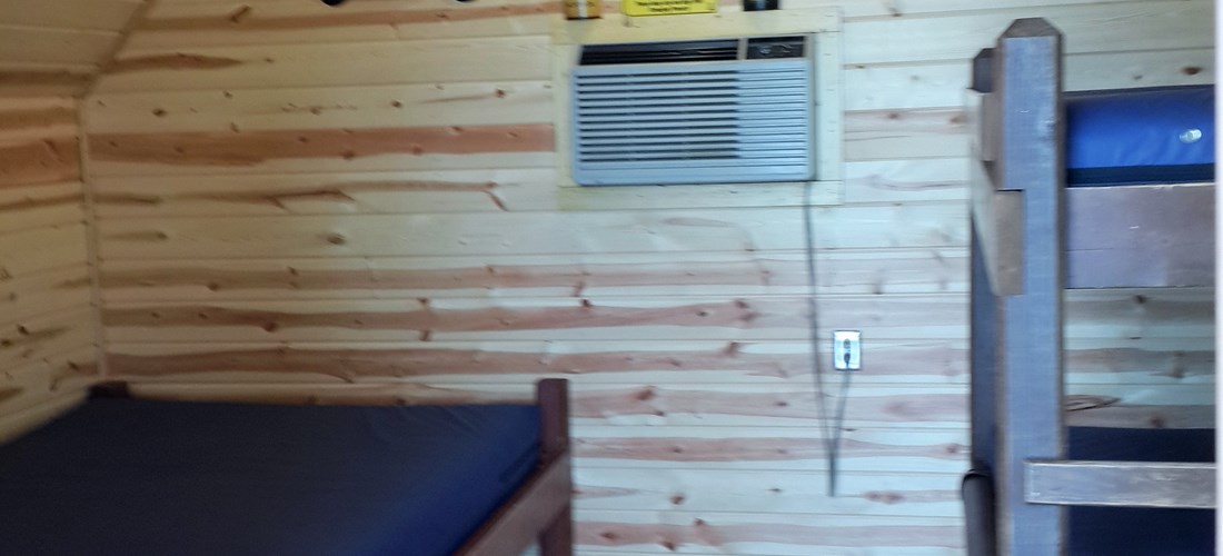 Camping Cabin 4
Full size bed and Bunk beds