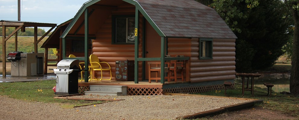1 Room Camping Cabin, Our Basic Camping cabin is located by the pond were you can relax and do some fishing.  Sleeps 4