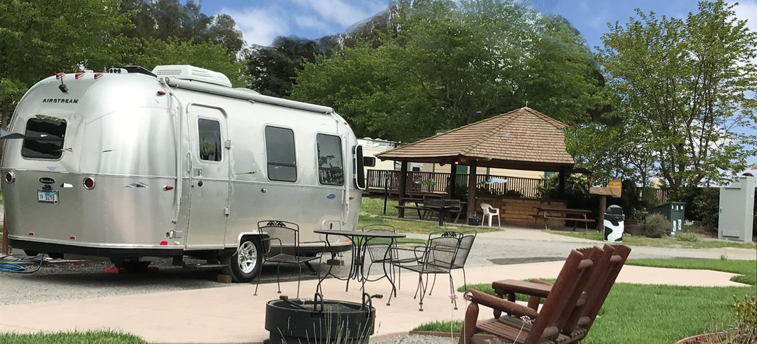 50amp pull thru patio sites have beautiful stamped concrete patio, furniture, firepit, free wifi and concierge septic pumping.  These huge pull thru sites are campers favorites and sell out quick.
