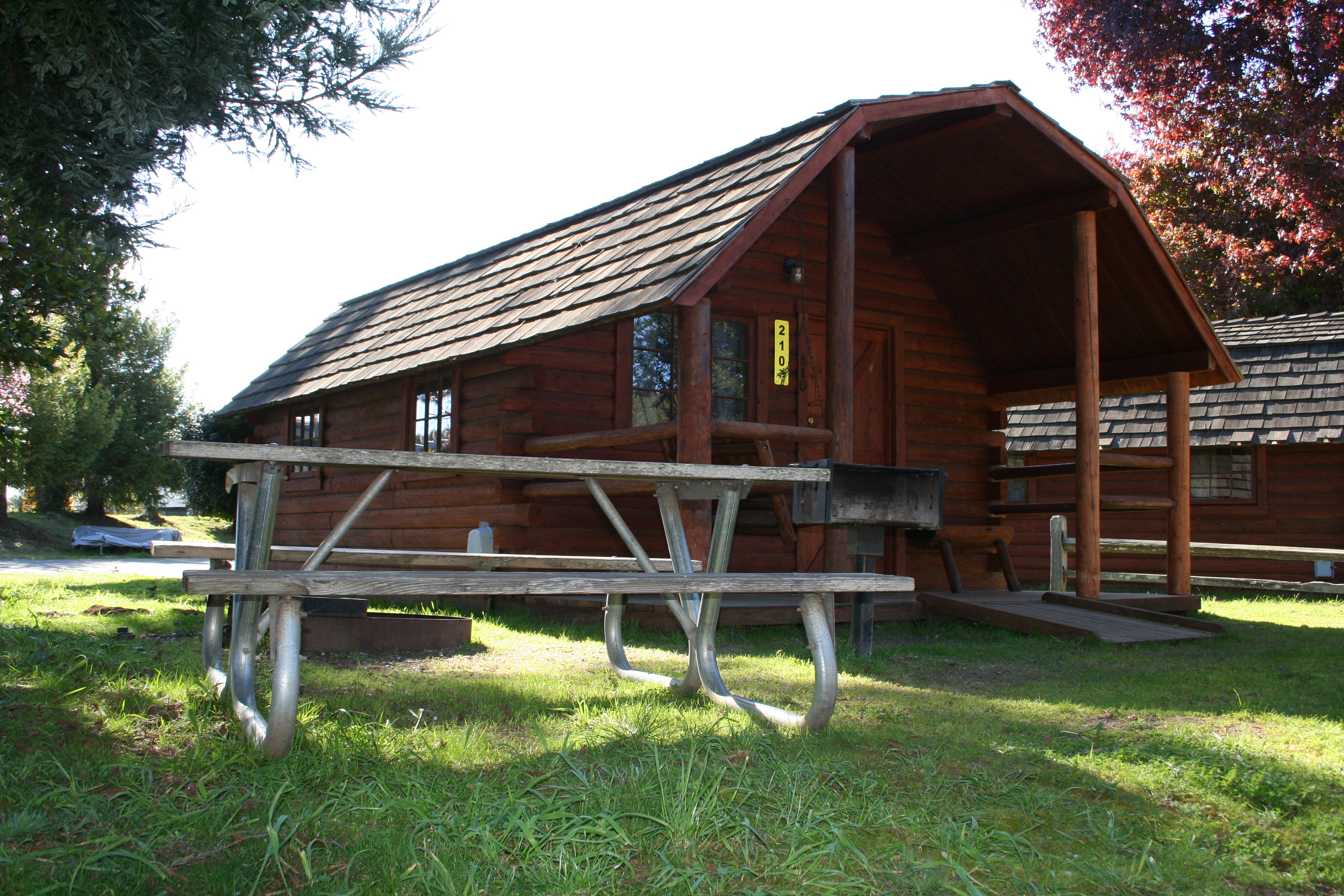 Our premium 2 room Camping Cabins have great outdoor space with a fire ring.
