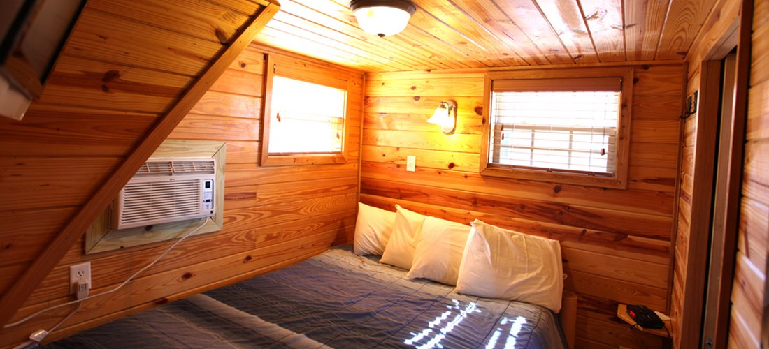 Private bedroom with queen bed.