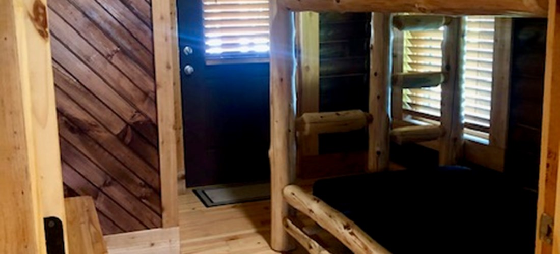 Teresa's Cabin second bedroom with one set of bunk beds.